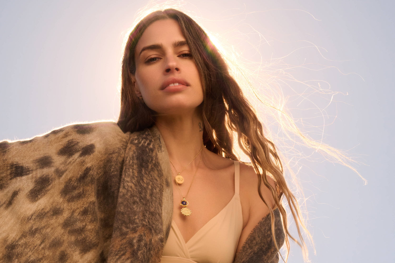 Model wearing Taurus Pendant Necklace, Lapis Scarab Necklace and Purpose Over Perfect affirmation pendant all in gold vermeil.