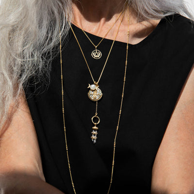 Model wearing Orbit Chain Necklace in 36" gold vermeil