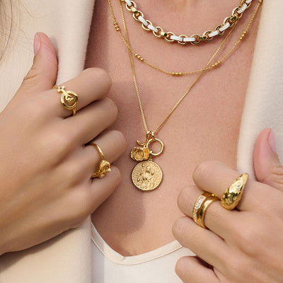 Model wearing Orbit Chain Necklace in gold vermeil