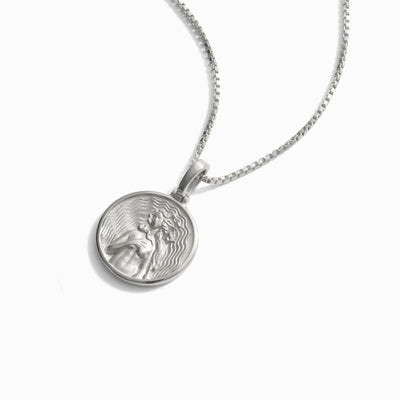 Mini round Aphrodite pendant on a box chain in silver