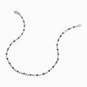 An Awe Inspired silver chain with black beads on it.