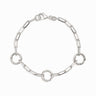 An Awe Inspired gold chain bracelet with three amulet links, called The Collector Bracelet in sterling silver