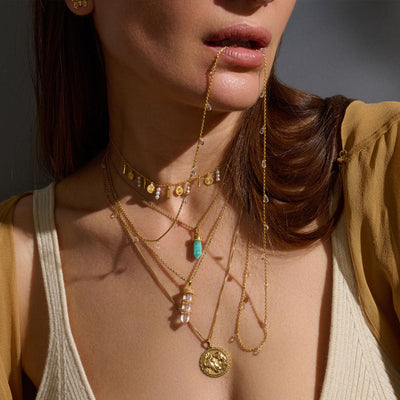 Model wearing Amazonite Amulet layered with mini Rhiannon pendant in gold vermeil