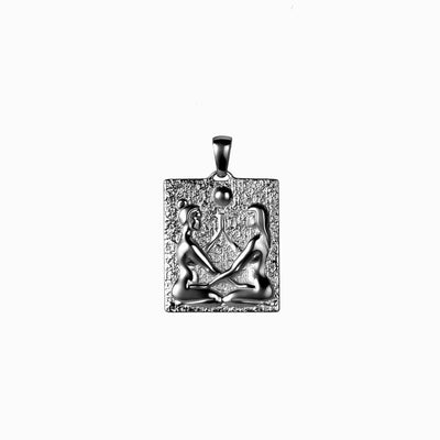 An Embrace Tablet pendant with an image of an Egyptian woman by Awe Inspired.