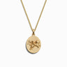 Awe Inspired's Zodiac Necklace features a gold chain adorned with a round pendant showcasing an embossed design of two flying cherubs, evoking the celestial grace of a Zodiac Goddess.