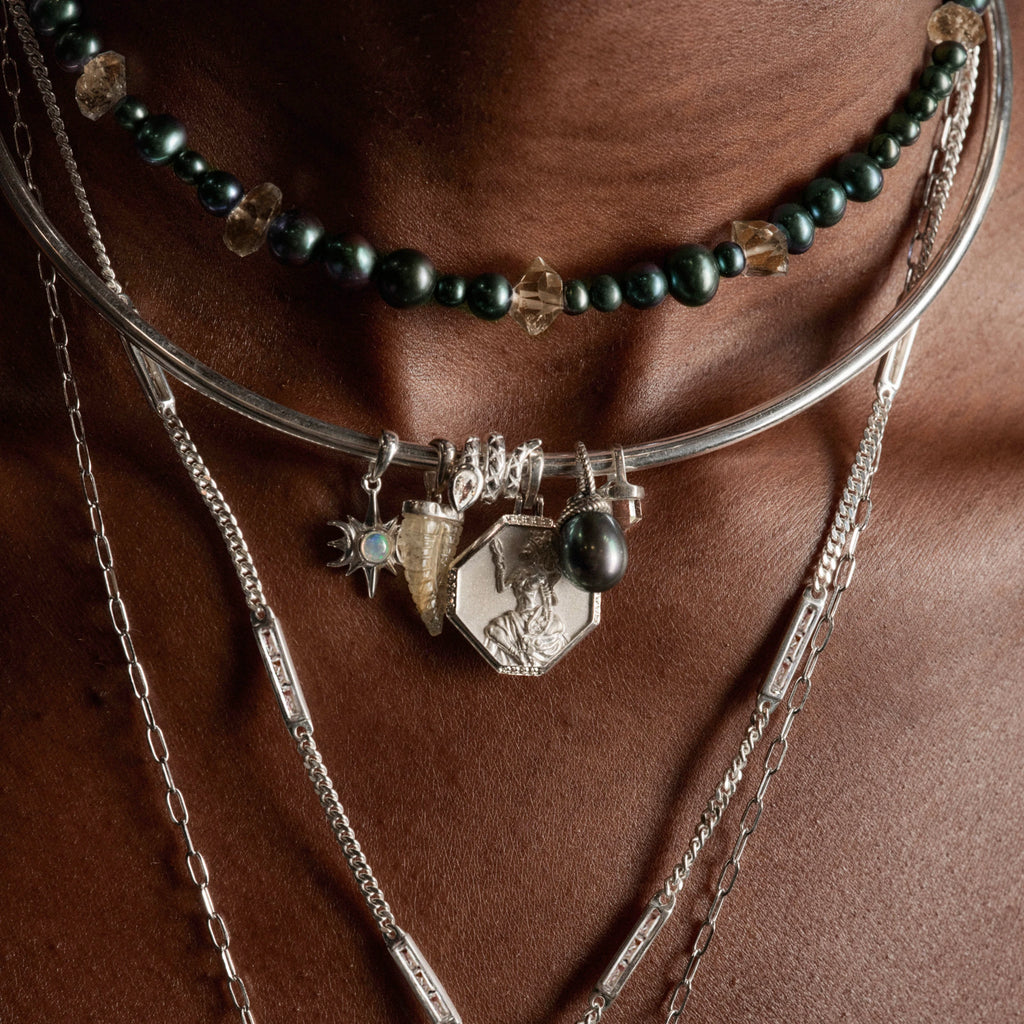 Awe Inspired Pendants Adorned Pearl Pendant
