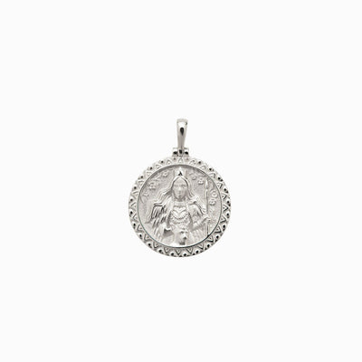 A Freya Pendant by Awe Inspired with an image of a woman on it.