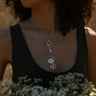 Model wearing standard round Nemesis pendant, Gate of Hades Key Amulet, Special Edition Hecate Pendant in sterling silver