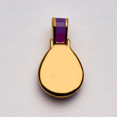 Back side of pear shaped Violet Aura Amulet  in gold vermeil