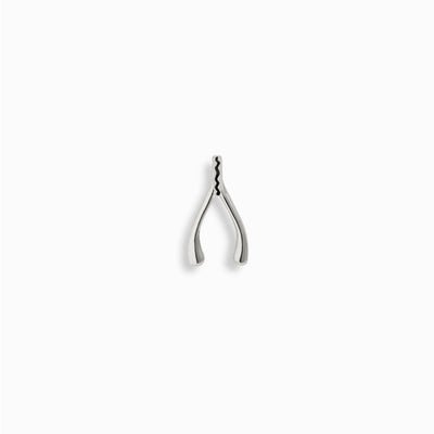 A Wishbone Amulet by Awe Inspired, a silver plated horseshoe shaped pendant on a white background.