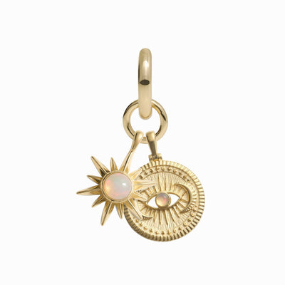 Presenting the Psychic Awakening Charm Earring by Awe Inspired, a gold charm earring featuring a sunburst design with an opal gemstone and an intricately detailed round pendant adorned with an eye motif. It's perfect for those who appreciate the mystical allure of a Cosmic Eye Amulet.