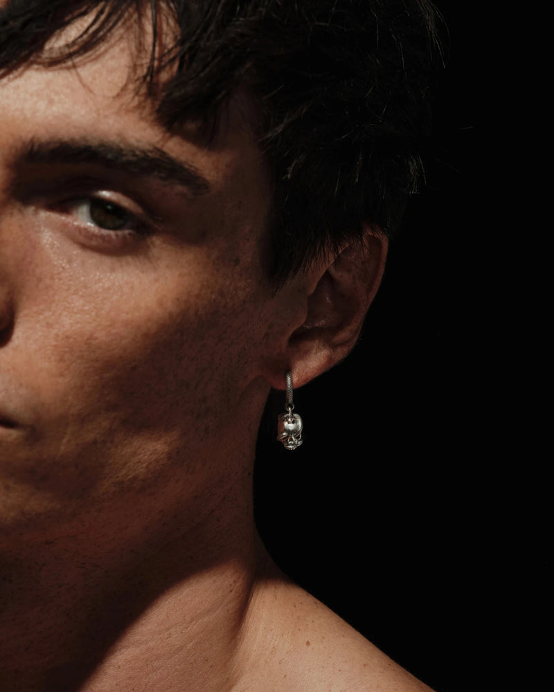 Awe Inspired Earrings Single Serpent Skull Huggie