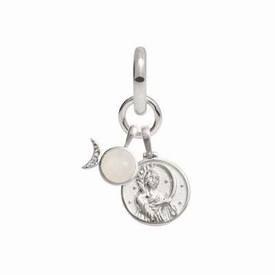 Elevate your collection with the Moonchild Charm Earring by Awe Inspired, featuring a stunning circular moon and stars motif. This silver charm showcases a crescent moon adorned with a captivating moonstone gemstone and a white orb, making it fit for any Greek Goddess. Perfect for any Charm Collector Earring collection.