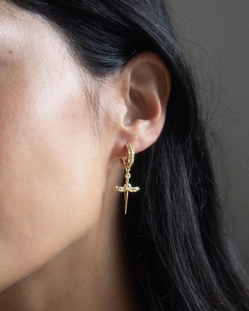 Awe Inspired Earrings Winged Sword Drop Huggies
