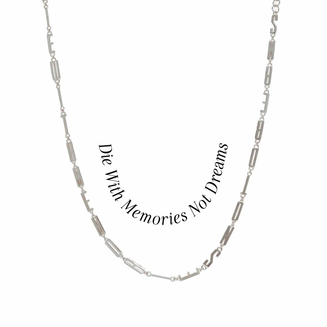The Men's Affirmation Necklace by Awe Inspired features a rectangular chain with the mantra "Die With Memories Not Dreams" engraved on a silver pendant.
