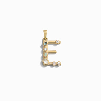 The Gemstone Initial Pendant by Awe Inspired, shaped like the letter "E" and adorned with bezel set opals and diamonds, makes for exquisite personalized jewelry.