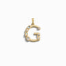 The Gemstone Initial Pendant by Awe Inspired is a gold pendant shaped like the letter "G," adorned with small round and oval bezel set gemstones, crafted as a unique piece of personalized jewelry.