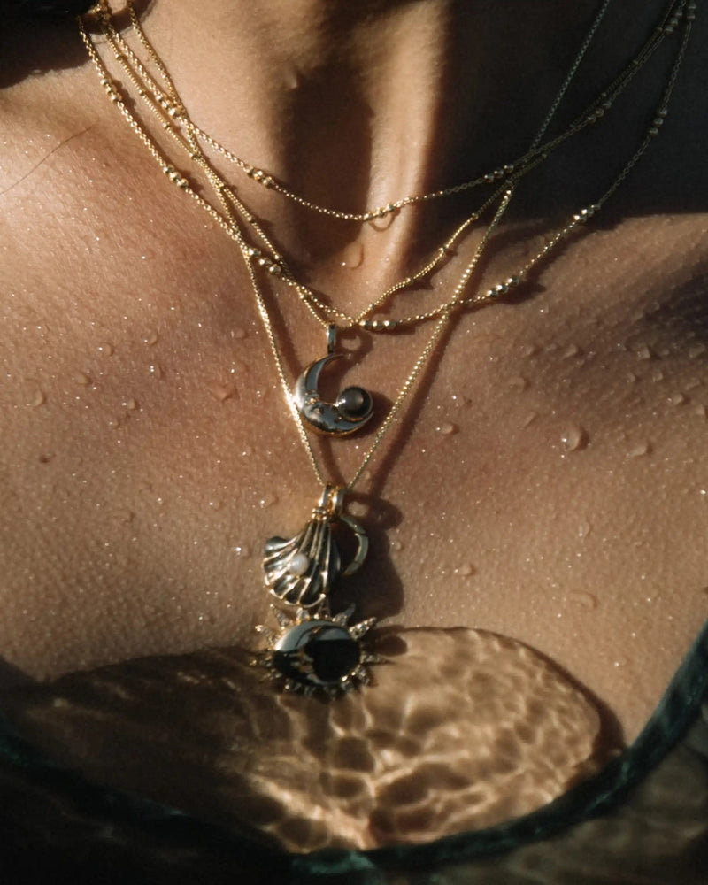 Awe Inspired Pendants Moonstone Black Mother of Pearl Carved Shell Amulet