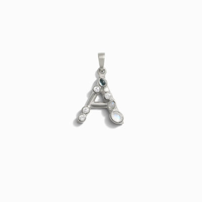 Introducing the "Gemstone Initial Pendant" by Awe Inspired—a captivating silver letter "A" pendant embellished with small bezel set gemstones, complete with a loop at the top for easy attachment to any necklace. This piece makes an excellent choice for personalized jewelry or initial charms.