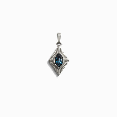 The Aura Pendant by Awe Inspired features a sleek geometric design with a central blue gemstone that enhances your chakra.