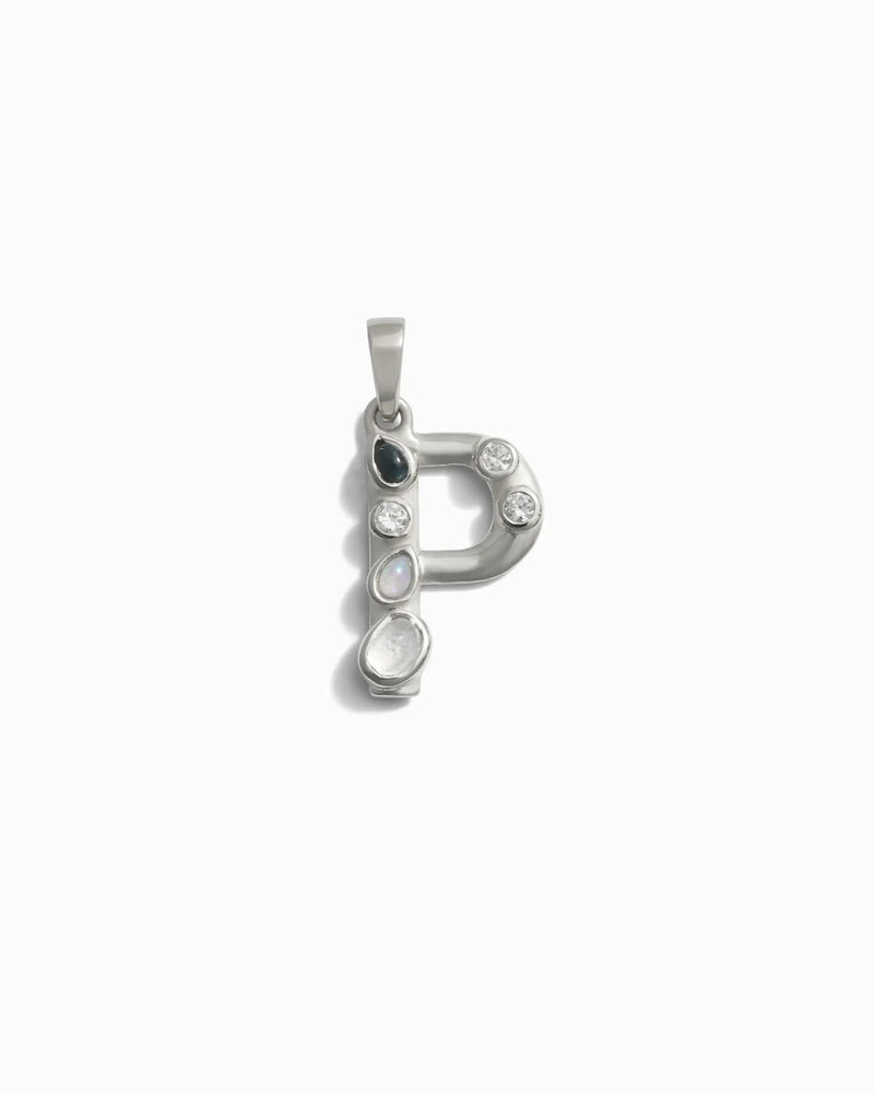 Awe Inspired's Gemstone Initial Pendant is a standout piece of personalized jewelry, featuring bezel-set gemstones on a silver pendant shaped like the letter "P.