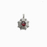 The Aura Pendant by Awe Inspired, a silver star-shaped pendant adorned with a red gem in the center, is pictured against a plain white background, exuding an aura of elegance.