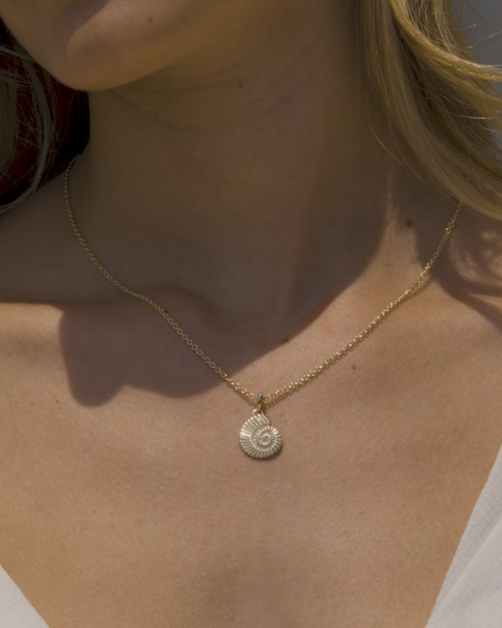 Diamond Spiral Shell Amulet