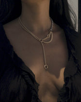 Asymmetrical Charm Collector Necklace